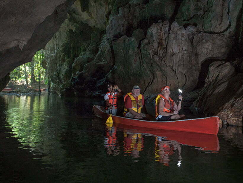 seniors at barton creek cave doing canoeing